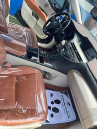 A picture of Clean 2012 Rx350 upgrade to 2015 with TAN clean interior