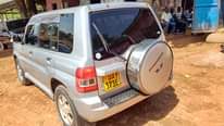 A picture of Pajero IO Black Top Engine 9 7m money needed 0706260442