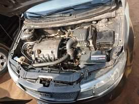 A picture of Kia cerato engine idea working perfect AC working buy and