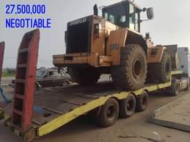 A picture of Back hoe Machine 13 500 000 Pell loader 27 500