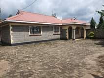 Kimathi M.