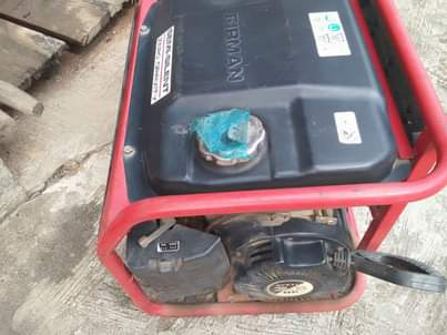A picture of TV and generator set Firman 1.5kva 