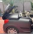 A picture of Peugeot 207 Open Car Year 2009 Engine 1590Cc Dark blue