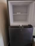 A picture of Smartec double door fridge and its fridge guard