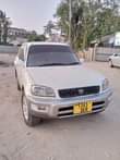 A picture of Rav4 milango mitano ipo Mbezi mwisho imepoa Bei mil 11