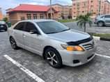 A picture of This is Camry 2010 model partly painted 4 plugs venza