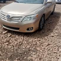 A picture of NEATLY USED 2010 CAMRY WITH COMPLETE ORIGINAL PAPERS AC PERFECTLY