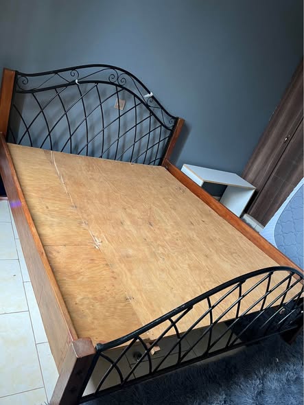 A picture of 5 6 Metalic wood bed and dressing table on sale
