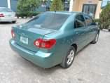 A picture of Toyota Corolla 2006 first body pan Neat interior Sound engine