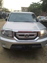 A picture of 2009 Honda pilot tokumbo accident free Price 9 2m Location