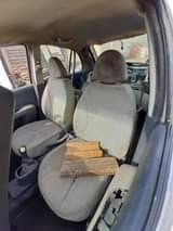 A picture of Nissan micra 2006 striped with paper
