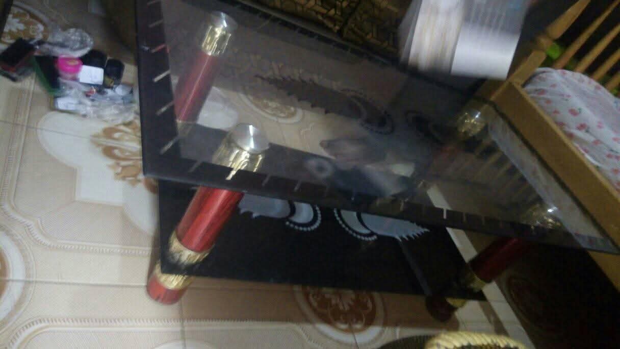 A picture of Sofa set bed glass table