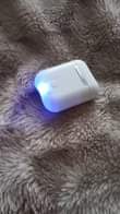 A picture of Bluetooth airpods Og 15000 tu call 0624 088 380