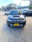 A picture of 2009 subaru forester black colour
