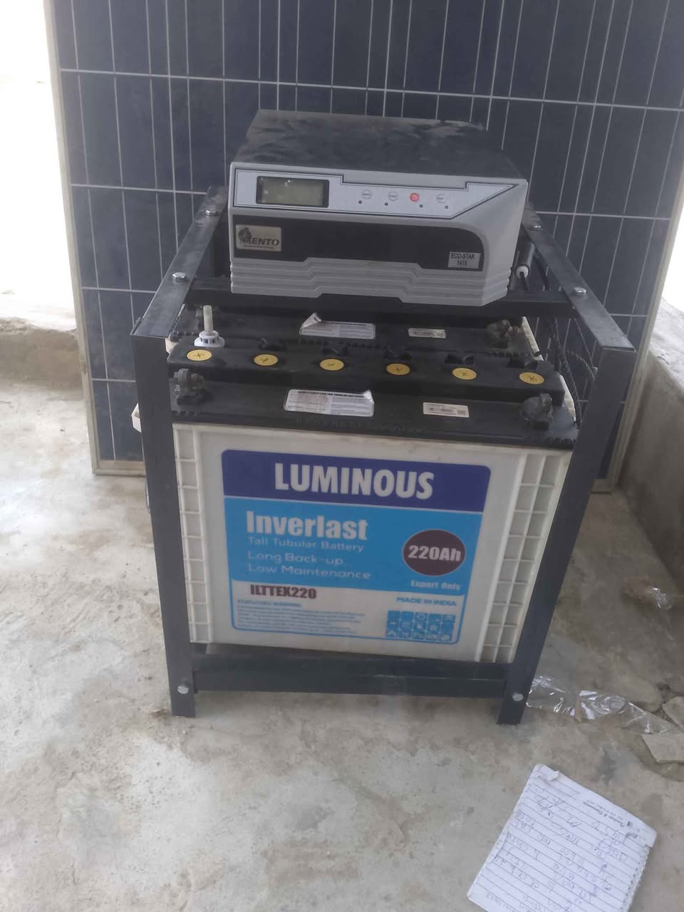 A picture of 1 4kva 12v with 2 batteries and 2 panels