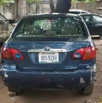A picture of Toyota Corolla 2006 engine and gear is ok AC is