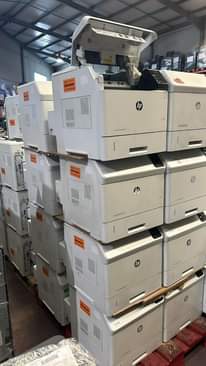 A picture of kyocera and hp mfp printers