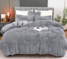 A picture of Fluffy duvets with two pillow cases at 140 000