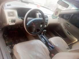 A picture of Honda baby location owerri price 800k with costorm papers engin