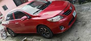 A picture of 2012 Corolla highest grade Everything is intact Engine AC and