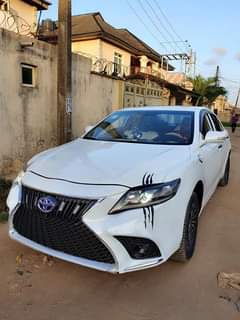 A picture of Good deal. V. Clean Toyota Camry XLE 08 Tiger face.