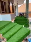 A picture of Artificial green grass carpets available in all sizes 0754140493