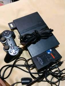 A picture of PS2 FULLSET 7 games and one pad for sale at