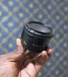 A picture of Lens 50mm plastic f1.8 Canon Hood Filter 220 000