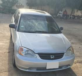 A picture of Honda Civic 2004 model 4 sale Clean body and interior