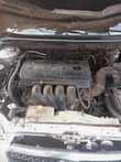A picture of Toyota corolla 05 engine is taping but not smoking just