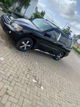 A picture of Sharp 2004 Toyota Highlander buy and traveling clean in and