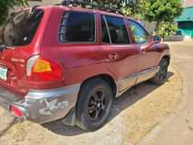 A picture of First body 2004 Hyundai Santa Fe with super sound engine