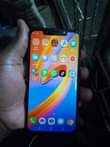 A picture of Tecno spark 3 with some cracks but working well clear