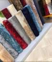 A picture of Fruffy and non Center carpets in different sizes