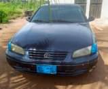 A picture of Toyota Camry tiny light Bake once Clean as seen ac
