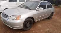 A picture of Clean Nigerian Used Silver Honda Civic Neatly Repainted Fabric interior