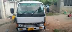 A picture of Canter For Sale Tone 2 5 Engine 4D30 price mil