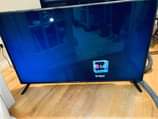 A picture of 320 000 last price for 32inch flat screen TV brand