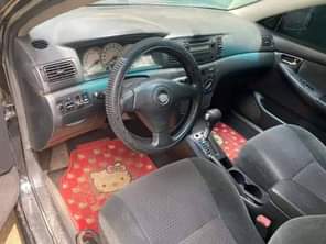A picture of 2005 Corolla few months used neatly painted Abuja airport road