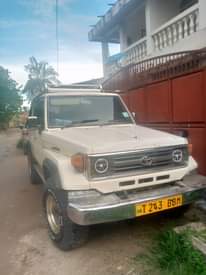 A picture of TOYOTA LAND CRUISER LX YEAR 2001 COLOUR WHITE ENGINE 1HZ