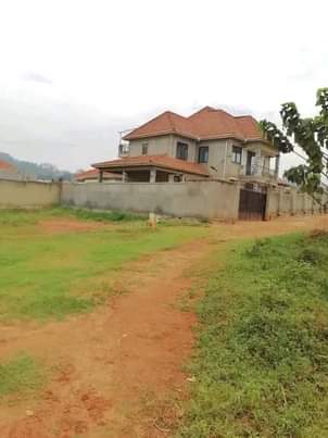 A picture of 50ft X 60ft Prime Commercial Private Land touching tarmac at