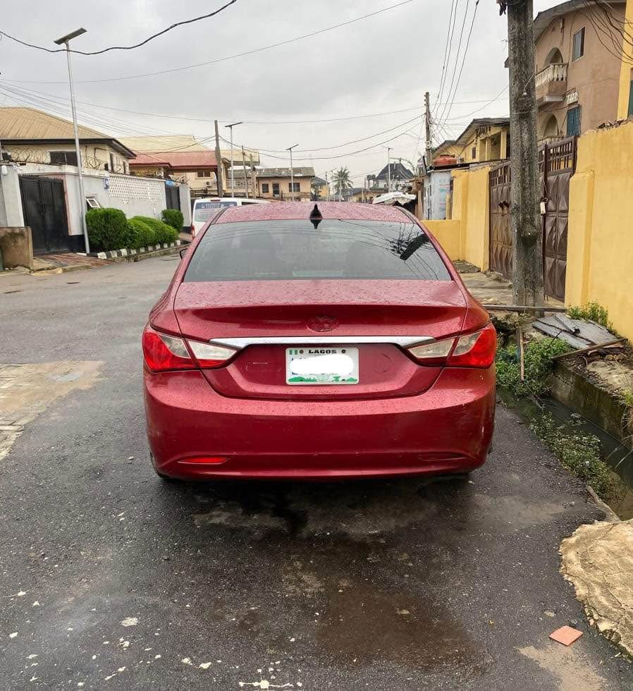 A picture of STILL AVAILABLE Clean Well Maintained Registered Red Hyundai Sonata 2012.