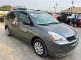 A picture of Neatly Baked Untampered Toyota Sienna 05