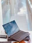 A picture of BRAND NEW BRAND NEW HP ENVY SUPER SLIM BROWN COLOR