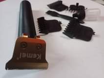 A picture of Kemel hair cutting original inakaa na chaji NASA s matatu