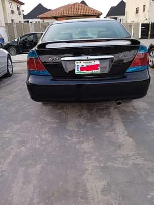 A picture of Toyota Camry 2004 4 plug Painted Engine and gear are