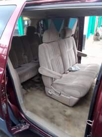 A picture of 2002 Toyota sienna oven backed on pure first body pan