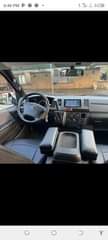 A picture of Toyota Hiace Hummer Buss. 2014.
