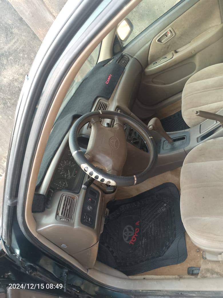 A picture of Toyota Camry. 2.6m negotiable