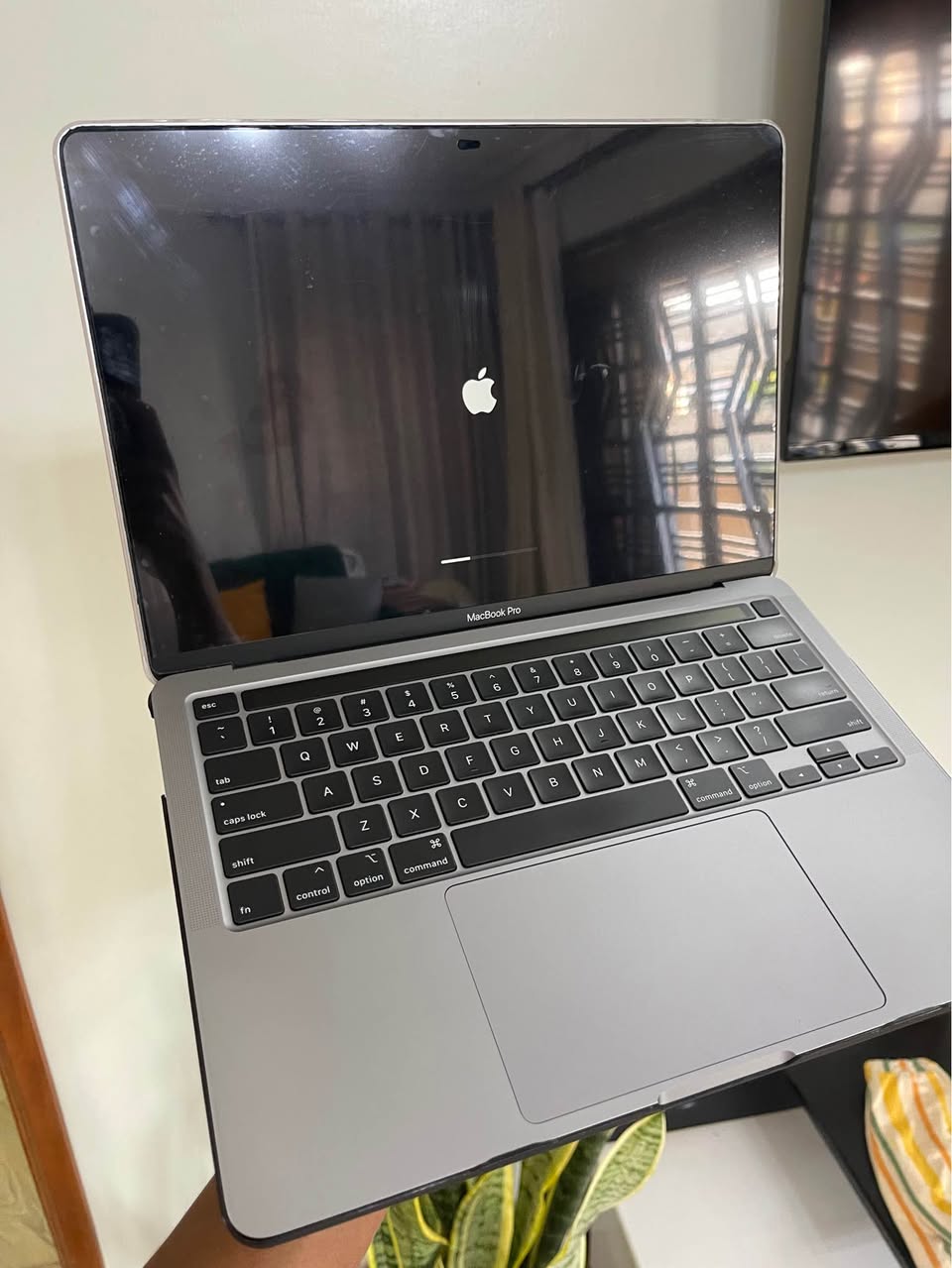 A picture of Apple Mac book pro Touch Bar with 512gb storage and